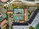 Aerial view of community tennis courts at 138 1St E St # 106, Tierra Verde, FL 33715