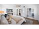 Main bedroom with king bed and walk-in closet at 138 1St E St # 106, Tierra Verde, FL 33715