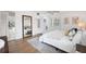 Bright bedroom with king bed and access to bathroom at 138 1St E St # 106, Tierra Verde, FL 33715