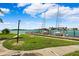 Wooden docks with boats, waterfront views at 138 1St E St # 106, Tierra Verde, FL 33715