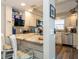 Kitchen with breakfast bar and modern finishes at 9166 Blind Pass Rd, St Pete Beach, FL 33706