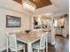 Bright dining area with a spacious table and chairs at 9166 Blind Pass Rd, St Pete Beach, FL 33706