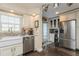 Modern kitchen with stainless steel appliances and ample counter space at 9166 Blind Pass Rd, St Pete Beach, FL 33706
