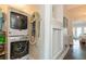 Laundry room with stackable washer and dryer at 9166 Blind Pass Rd, St Pete Beach, FL 33706