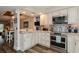 Modern kitchen with stainless steel appliances and granite countertops at 9166 Blind Pass Rd, St Pete Beach, FL 33706