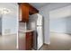Modern kitchen with stainless steel appliances and wood cabinets at 5660 80Th N St # A208, St Petersburg, FL 33709