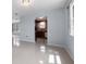 Dining room with a view into the kitchen at 5660 80Th N St # A208, St Petersburg, FL 33709