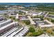 Aerial perspective of condo building, highlighting its location and surroundings at 5660 80Th N St # A208, St Petersburg, FL 33709