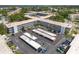 Aerial view of condo complex with ample parking at 5660 80Th N St # A208, St Petersburg, FL 33709