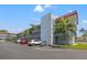 Exterior view of a two-story building with parking at 5660 80Th N St # A208, St Petersburg, FL 33709