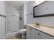 Updated bathroom with walk-in shower and modern vanity at 5660 80Th N St # A208, St Petersburg, FL 33709