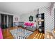 Gathering room with hardwood floors, patterned wallpaper and balcony access at 50 Coe Rd # 331, Belleair, FL 33756