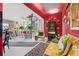 Open living room showcasing a spiral staircase and eclectic decor at 50 Coe Rd # 331, Belleair, FL 33756
