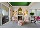 Elegant living room with fireplace and access to a balcony at 50 Coe Rd # 331, Belleair, FL 33756