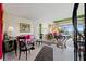 Bright and airy living room with colorful seating and a view at 50 Coe Rd # 331, Belleair, FL 33756