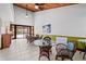 Casual community room with tables and chairs, ideal for gatherings at 50 Coe Rd # 331, Belleair, FL 33756