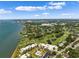 Aerial view showing location near water and golf course at 50 Coe Rd # 331, Belleair, FL 33756