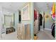 Large walk-in closet with ample shelving and drawers at 50 Coe Rd # 331, Belleair, FL 33756