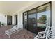 Spacious balcony with golf course views and sliding glass doors at 50 Coe Rd # 331, Belleair, FL 33756