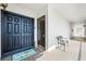 Condo entry with double doors and a welcoming mat at 50 Coe Rd # 331, Belleair, FL 33756