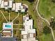 Top-down view of condo complex with pool and landscaping at 50 Coe Rd # 331, Belleair, FL 33756