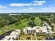 Condo community nestled on a golf course, aerial view at 50 Coe Rd # 331, Belleair, FL 33756