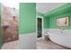 Spa-like bathroom with a freestanding tub and walk-in shower at 50 Coe Rd # 331, Belleair, FL 33756