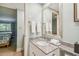 Bathroom with granite countertop and vanity sink at 36750 Us Highway 19 N # 20-213, Palm Harbor, FL 34684