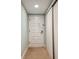 White door entryway with light walls and carpet at 36750 Us Highway 19 N # 20-213, Palm Harbor, FL 34684