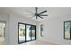 Bedroom with a large sliding glass door leading to the pool area at 2519 N Riverside Dr, Tampa, FL 33602