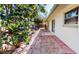 Backyard view of brick patio and back doors to home at 679 Lake Maggiore S Blvd, St Petersburg, FL 33705