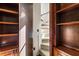 View of a spiral staircase from a library at 7725 Still Lakes Dr, Odessa, FL 33556