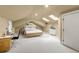 Spacious bedroom with built-in workspace and skylights offering natural light at 7725 Still Lakes Dr, Odessa, FL 33556