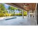 Outdoor oasis with covered patio, built-in grill, and refreshing pool at 2519 N Riverside Dr, Tampa, FL 33602