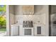 Stainless steel outdoor kitchen with built-in refrigerator at 2519 N Riverside Dr, Tampa, FL 33602