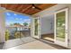 Spacious balcony with access to an interior room and distant neighborhood views at 2519 N Riverside Dr, Tampa, FL 33602