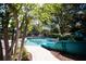 Resort-style pool with waterslide, perfect for relaxing and recreation at 36750 Us Highway 19 N # 15-310, Palm Harbor, FL 34684