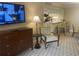 Comfortable living room featuring a TV and ample seating at 36750 Us Highway 19 N # 15-310, Palm Harbor, FL 34684