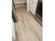 Kitchen features wood-look tile flooring at 36750 Us Highway 19 N # 15-310, Palm Harbor, FL 34684