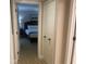 Bedroom with a king-size bed and access to a balcony at 36750 Us Highway 19 N # 15-310, Palm Harbor, FL 34684