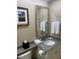Bathroom vanity with granite countertop and a large mirror at 36750 Us Highway 19 N # 15-310, Palm Harbor, FL 34684