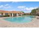Community pool with a clubhouse and surrounding landscaping at 6319 Vista Verde E Dr, Gulfport, FL 33707
