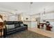 Modern kitchen with white cabinets, breakfast bar and dining area at 6319 Vista Verde E Dr, Gulfport, FL 33707