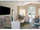 Clubhouse living area with comfortable seating and pool view at 6319 Vista Verde E Dr, Gulfport, FL 33707