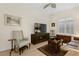 Relaxing living area with comfortable seating and flat-screen TV at 6319 Vista Verde E Dr, Gulfport, FL 33707