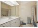 Clean bathroom with single vanity, shower/tub combo and linen closet at 6319 Vista Verde E Dr, Gulfport, FL 33707