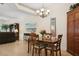 Bright dining area with hardwood floors and wood furniture at 6319 Vista Verde E Dr, Gulfport, FL 33707