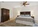 Large bedroom with king-size bed, ample closet space and ceiling fan at 6319 Vista Verde E Dr, Gulfport, FL 33707