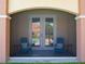 Screened-in patio with two chairs and access to the pool at 6319 Vista Verde E Dr, Gulfport, FL 33707