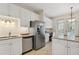 Modern kitchen with stainless steel appliances and granite countertops at 6319 Vista Verde E Dr, Gulfport, FL 33707
